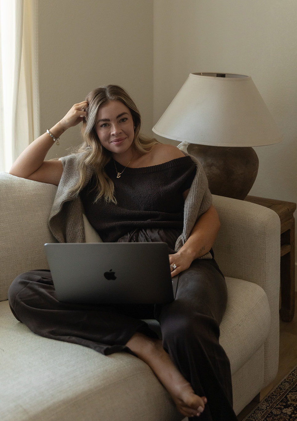 BryAnn Buhl seated with her laptop